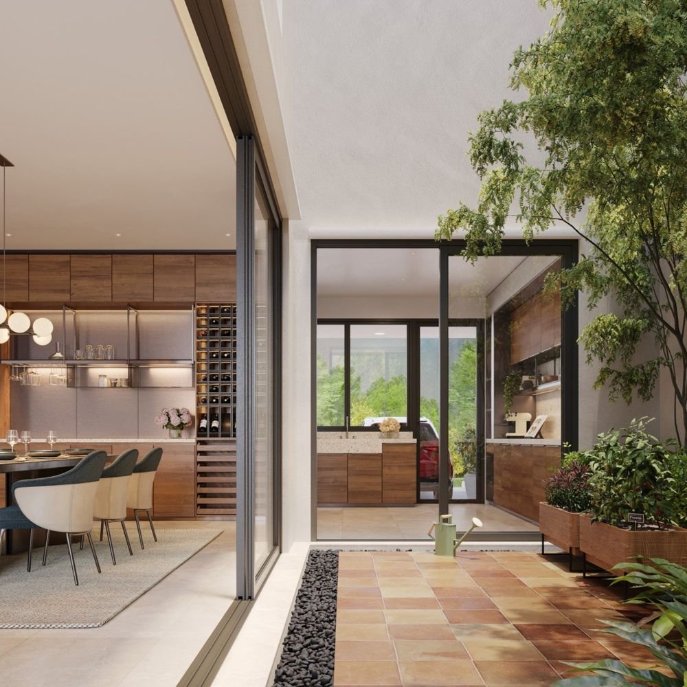 Dining area opening onto an internal courtyard with planters