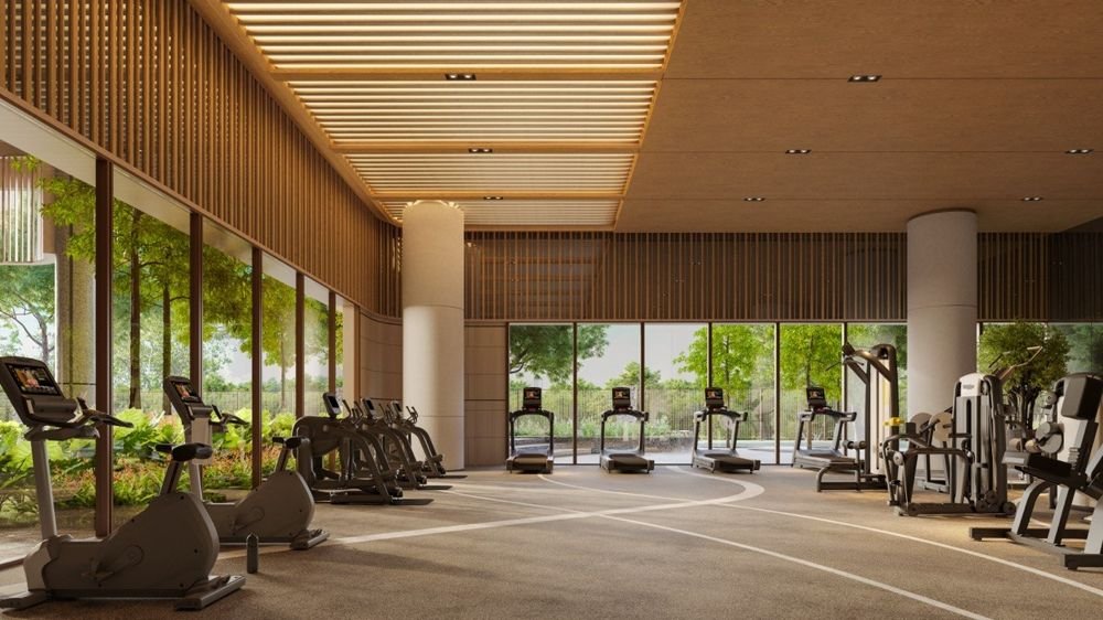 Gym with treadmills and cycling machines facing the garden
